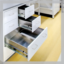 Franklin International Research and Development Lab: White Cabinets with three metal drawers open displaying no snag runners.